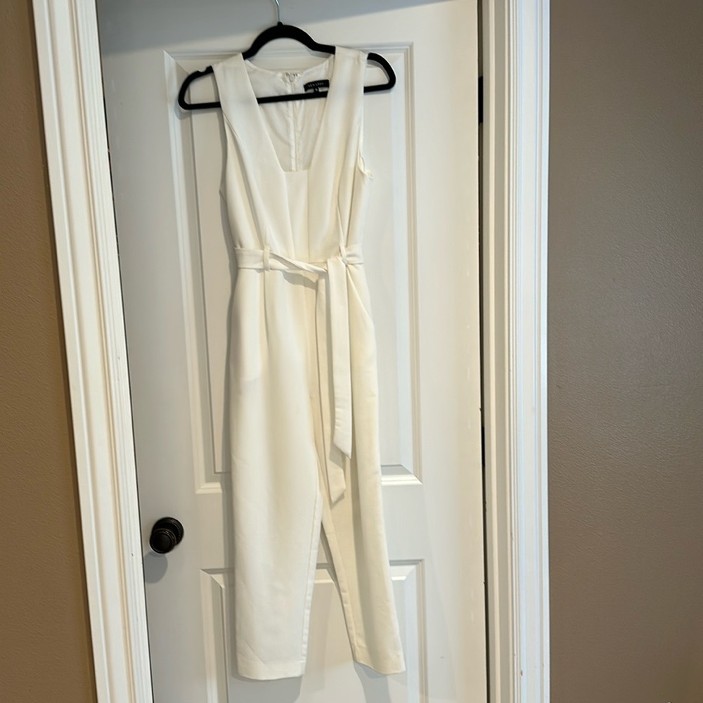 new look white sleeveless jumpsuit with belt. Worn twice.